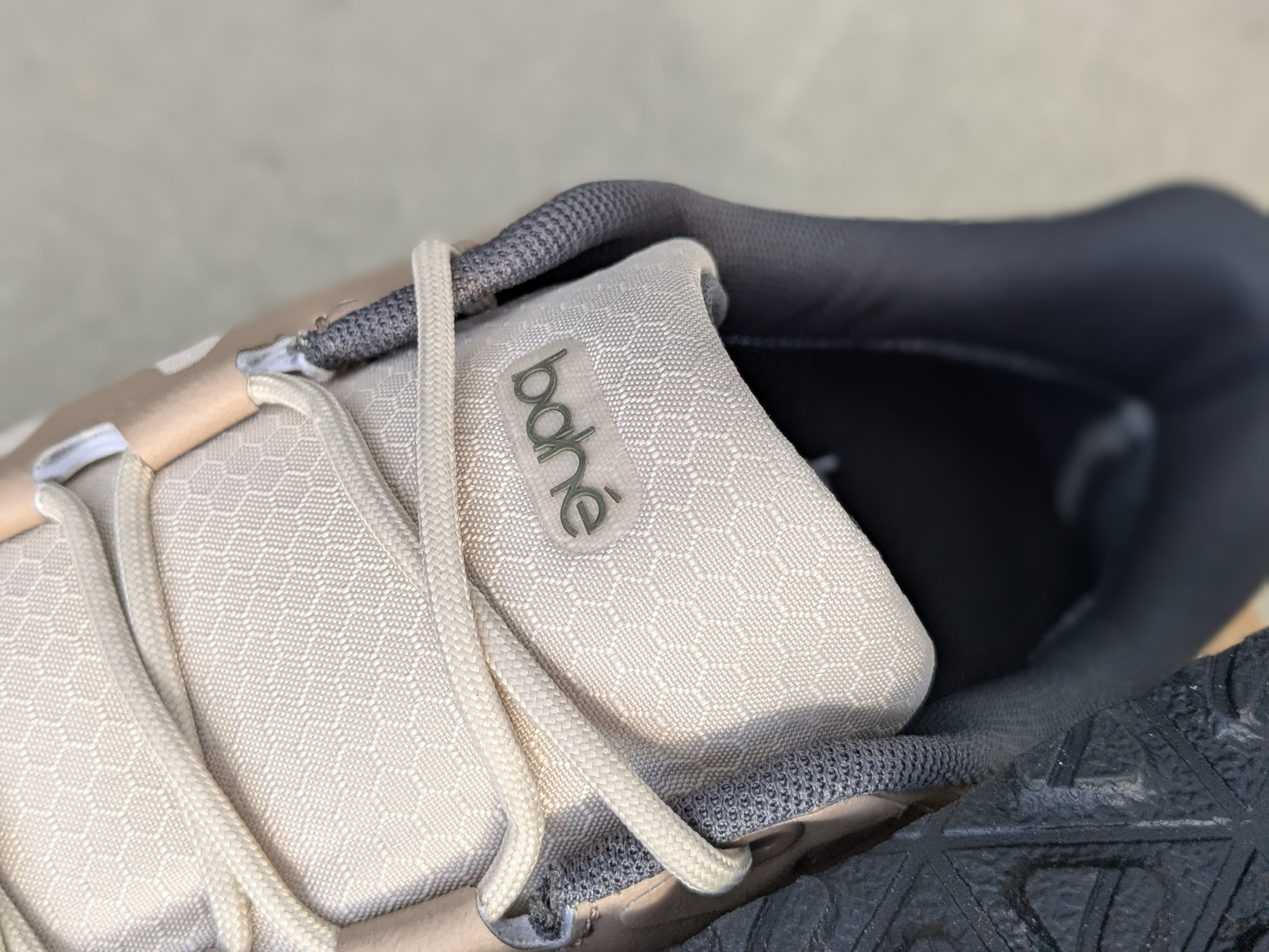 Bahé Rewild outsole showing 2.5mm lugs and hybrid trail road pattern