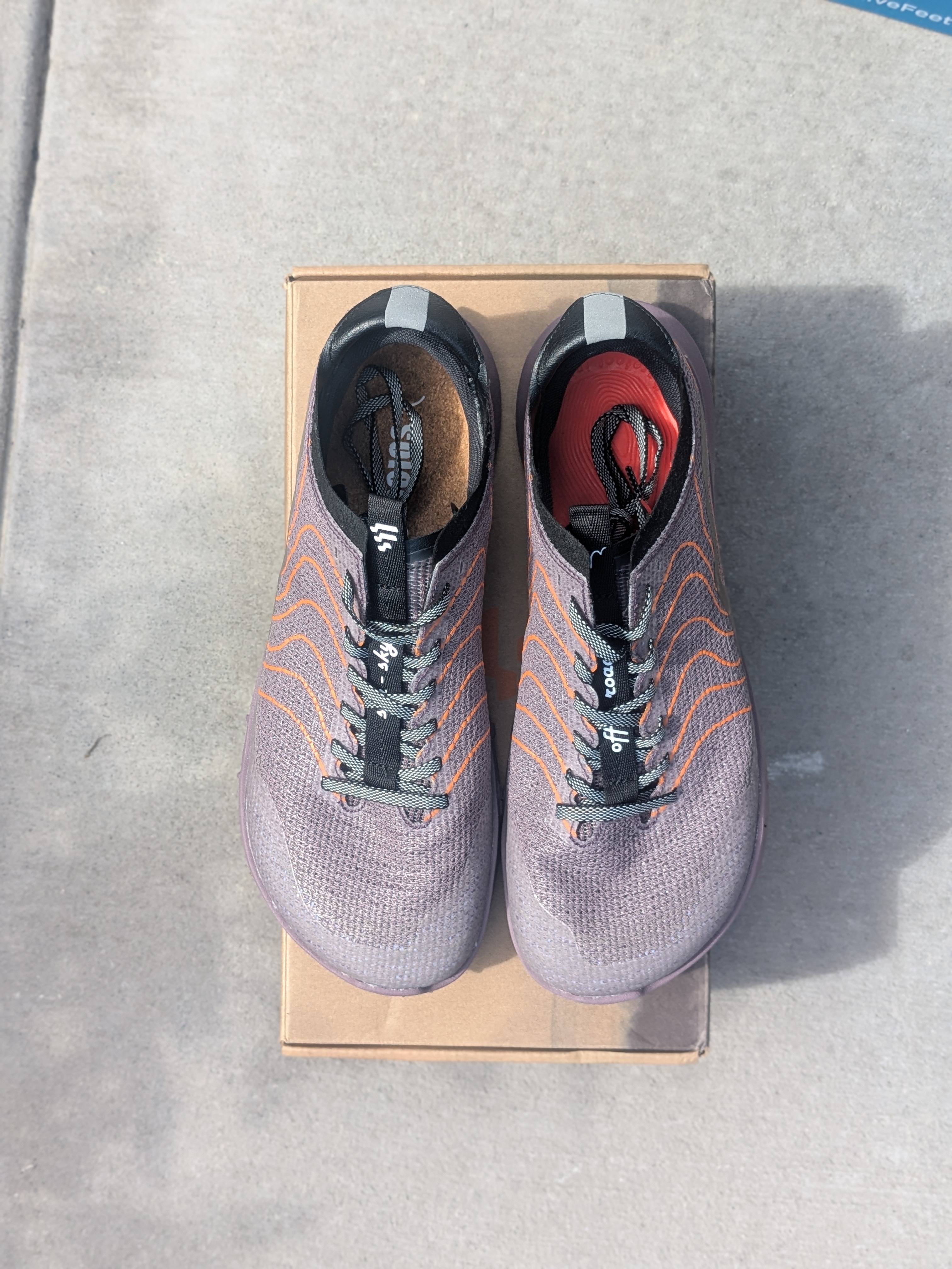 Lono Barefoot Verve pair shot, side view on trail