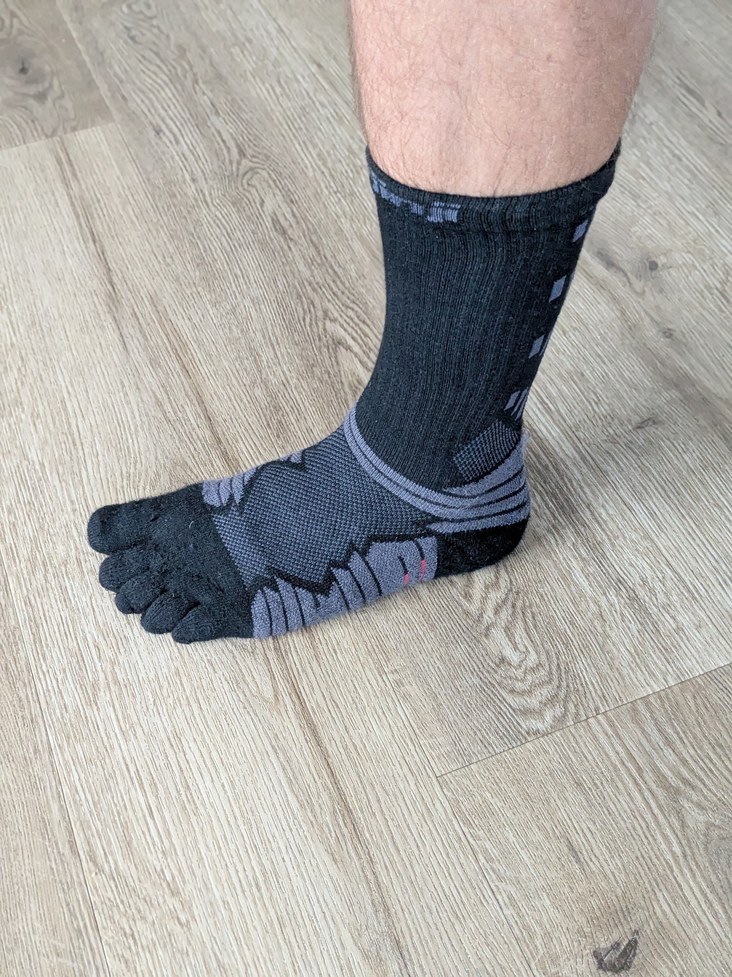 Injinji Ultra Run Crew showing the height on the leg — sits mid-calf